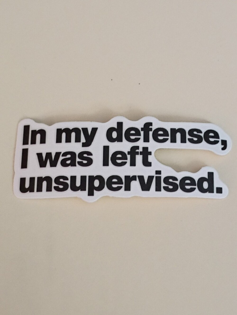 10/$10 Sticker - In My Defense I Was Left Unsupervised Black Text